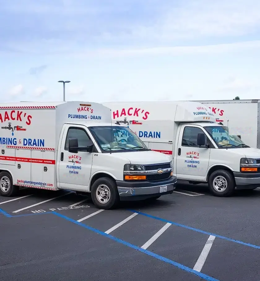 Hack's Plumbing & Drain service vans