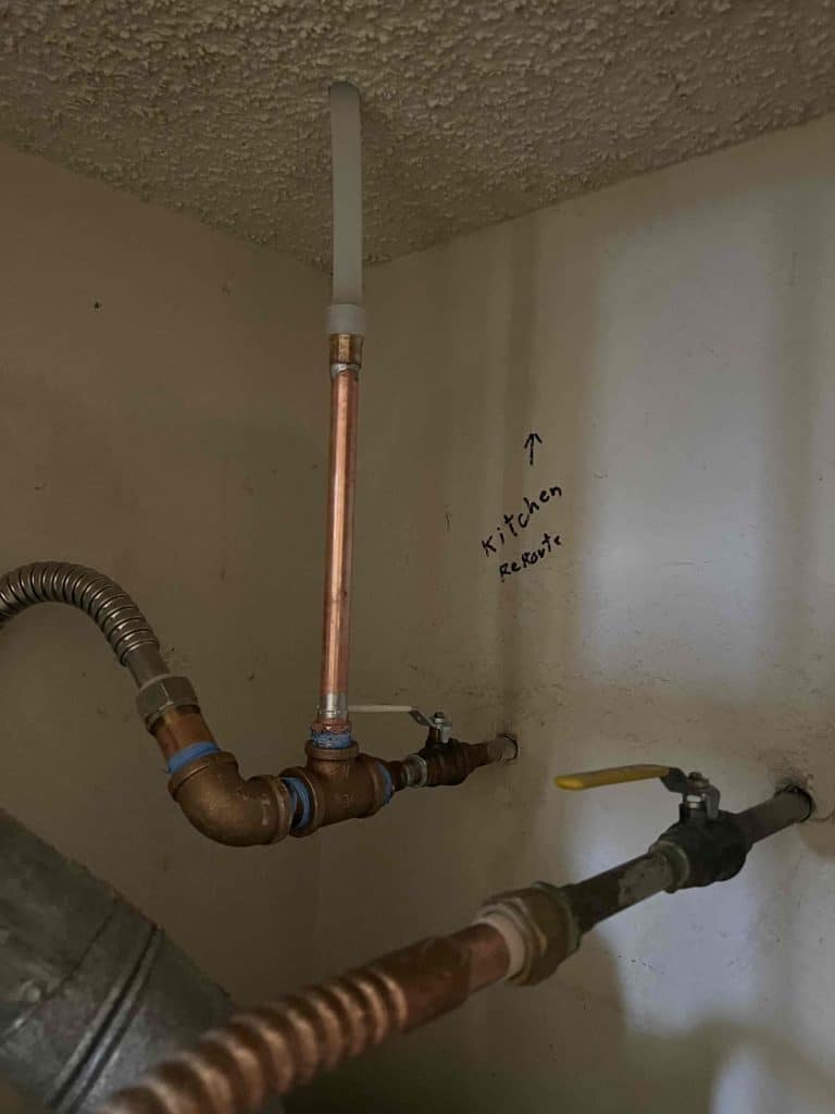 Copper re-route dropped from the ceiling to a kitchen shut-off