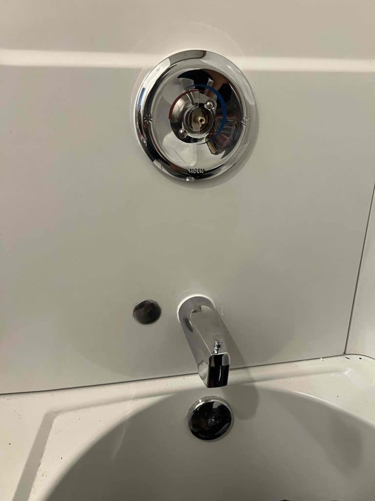 Shower valve trim and tub spout after a tub replacement