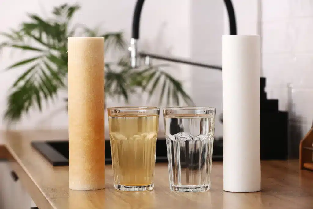 Hard water mineral buildup affecting household plumbing and water quality
